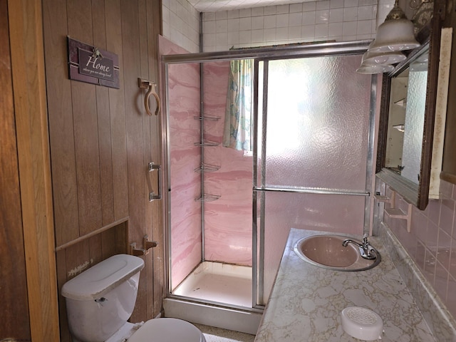 130 Hunsaker St, Fairmont, WV 26554 - bathroom with vanity, wood walls, toilet, and a shower stall