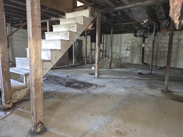 130 Hunsaker St, Fairmont, WV 26554 - unfinished below grade area featuring stairs and water heater