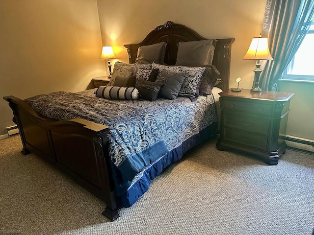bedroom featuring carpet floors, baseboards, and a baseboard heating unit
