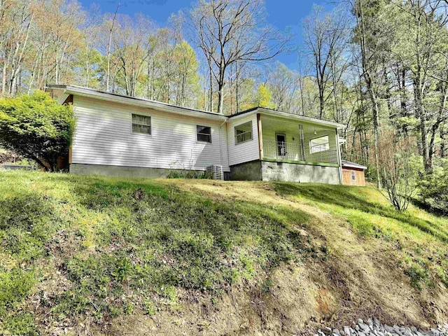 108 Toothman Run Rd, Rivesville, WV 26588 - rear view of property featuring covered porch