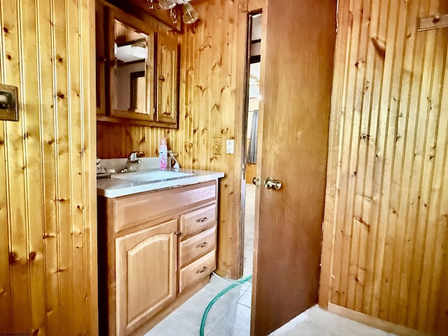 108 Toothman Run Rd, Rivesville, WV 26588 - bathroom with vanity and wood walls