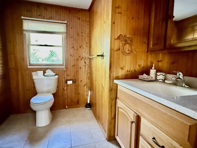 108 Toothman Run Rd, Rivesville, WV 26588 - half bathroom featuring vanity, tile patterned floors, wooden walls, and toilet