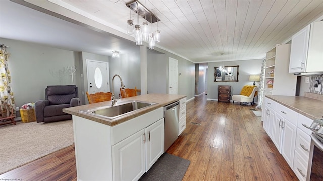 kitchen featuring stainless steel dishwasher, wood finished floors, open floor plan, white cabinetry, and a sink