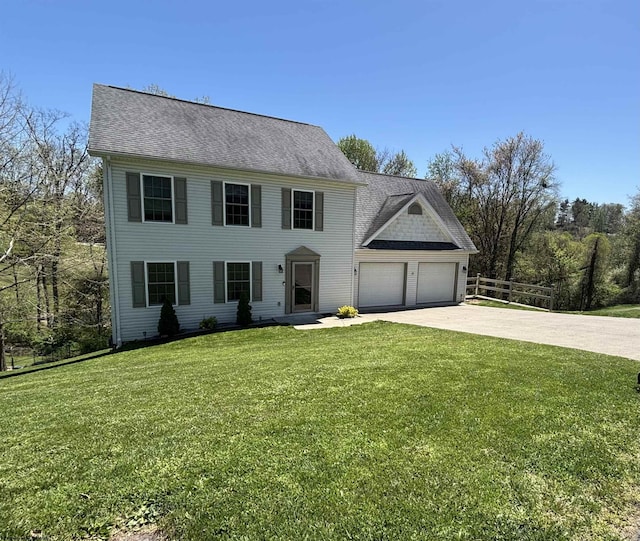 7 Mayberry Dr, Fairmont, WV 26554 - colonial-style house featuring fence, driveway, a front lawn, and a garage