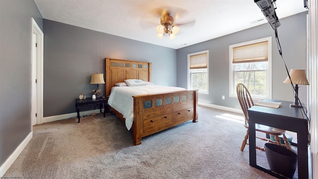 7 Mayberry Dr, Fairmont, WV 26554 - bedroom with baseboards, light carpet, a ceiling fan, and visible vents