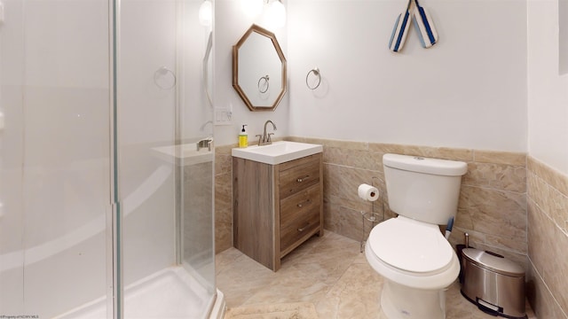 7 Mayberry Dr, Fairmont, WV 26554 - full bath with wainscoting, tile walls, a shower stall, and toilet