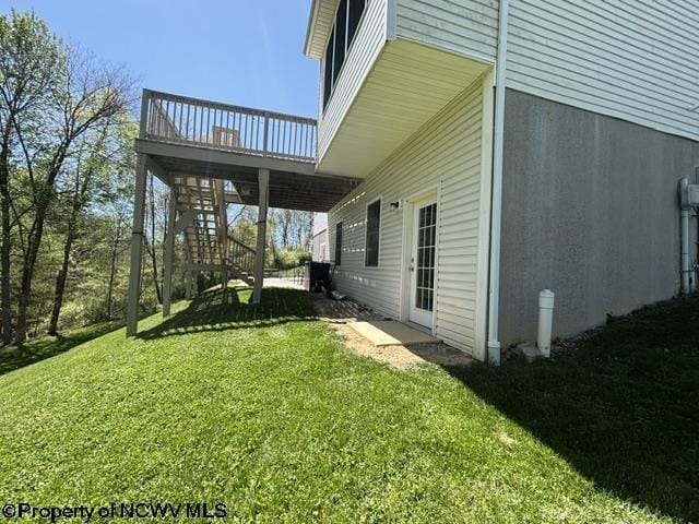 7 Mayberry Dr, Fairmont, WV 26554 - view of side of home featuring a lawn, a wooden deck, and stairway