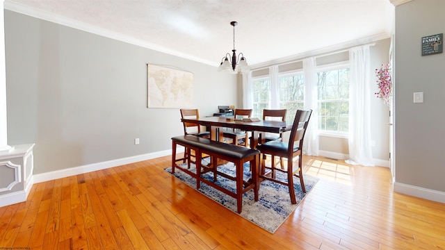 7 Mayberry Dr, Fairmont, WV 26554 - dining area with baseboards, ornamental molding, and a notable chandelier