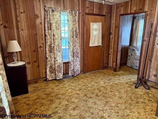 346 Parkway Ave, Anmoore, WV 26323 - interior space featuring wood walls and carpet