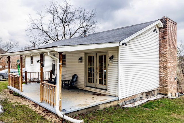 210 Rosedale Hill Rd, Maidsville, WV 26541 - rear view of property featuring roof with shingles, a chimney, and a yard