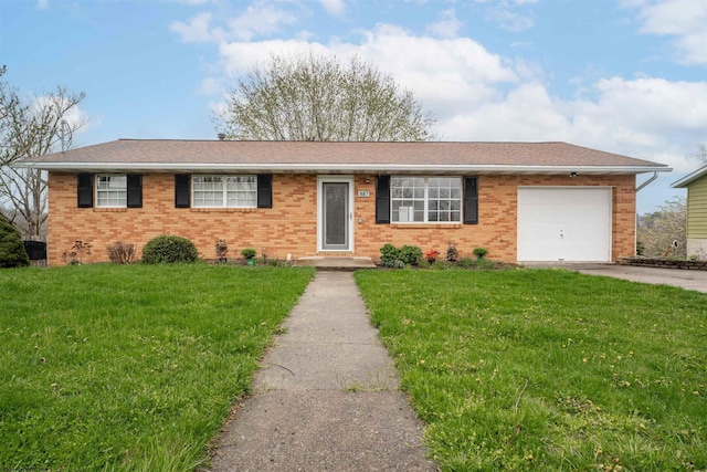 ranch-style house with a garage, a front lawn, brick siding, a shingled roof, and driveway