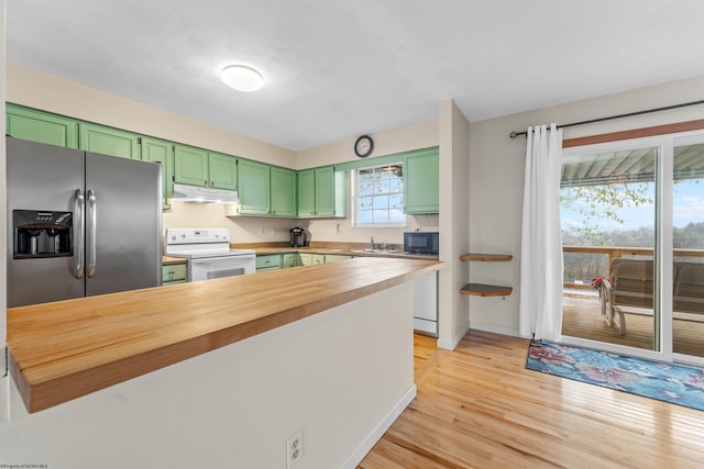 kitchen featuring black microwave, white electric range, under cabinet range hood, stainless steel refrigerator with ice dispenser, and green cabinets