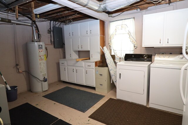 laundry area featuring independent washer and dryer, gas water heater, electric panel, and cabinet space