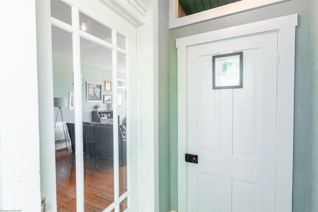 doorway featuring wood finished floors