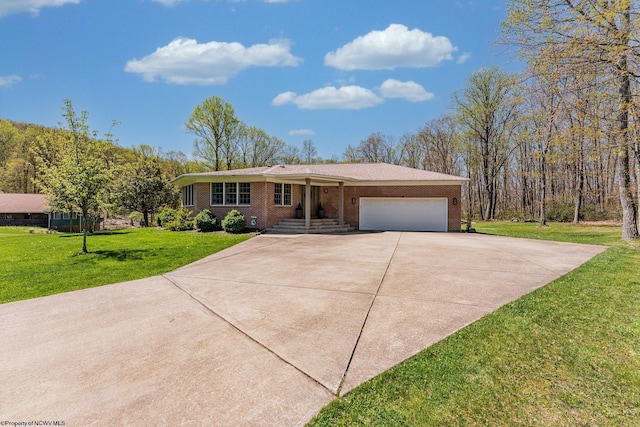 ranch-style home with an attached garage, driveway, a front lawn, and brick siding