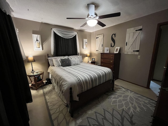 bedroom with baseboards, carpet, and ceiling fan