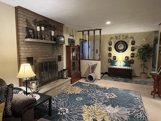 carpeted living area featuring recessed lighting and a fireplace