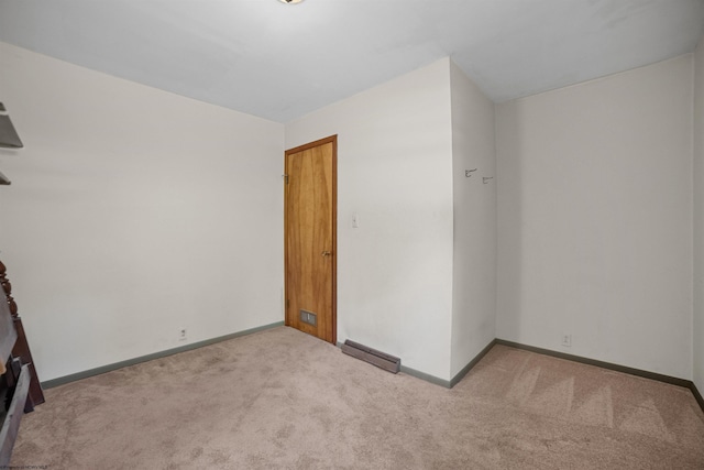 interior space with baseboards and a baseboard heating unit