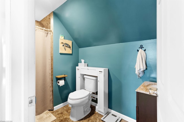 full bath featuring vanity, curtained shower, vaulted ceiling, and toilet