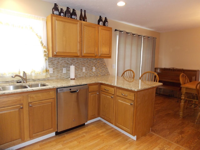 260 Donna Ave, Morgantown, WV 26505 - kitchen with a peninsula, light stone countertops, light wood-style floors, a sink, and dishwasher