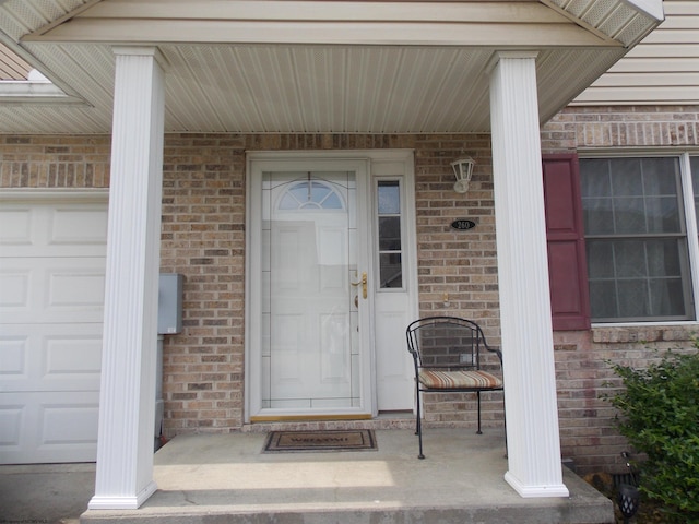 260 Donna Ave, Morgantown, WV 26505 - view of exterior entry with a porch and brick siding