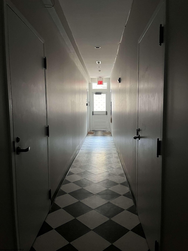hall with dark floors