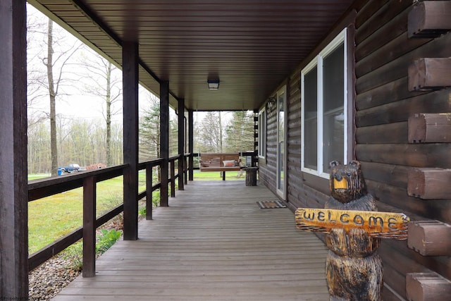 wooden deck featuring a porch