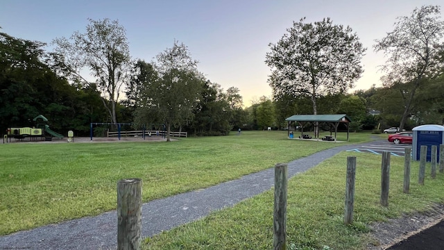 view of community featuring a yard, a gazebo, and playground community