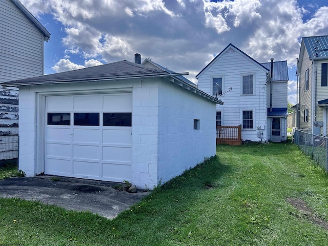 garage with fence