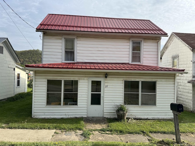 view of front of house featuring metal roof