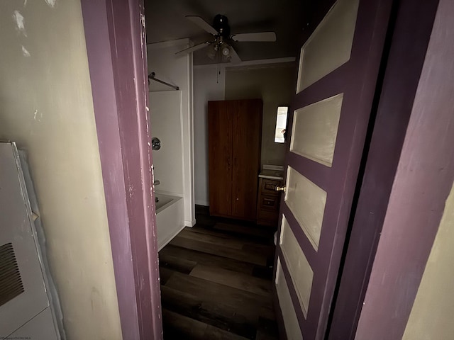 interior space featuring ceiling fan and wood finished floors