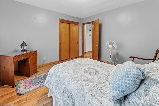 1060 Takoma St, Morgantown, WV 26505 - bedroom with a closet, light wood-style floors, and baseboards