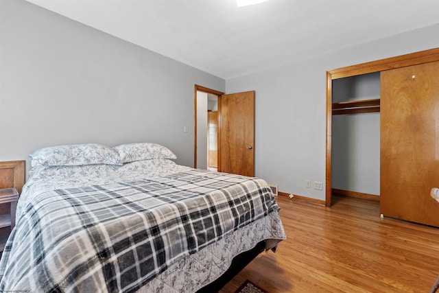1060 Takoma St, Morgantown, WV 26505 - bedroom featuring baseboards, light wood-style floors, and a closet