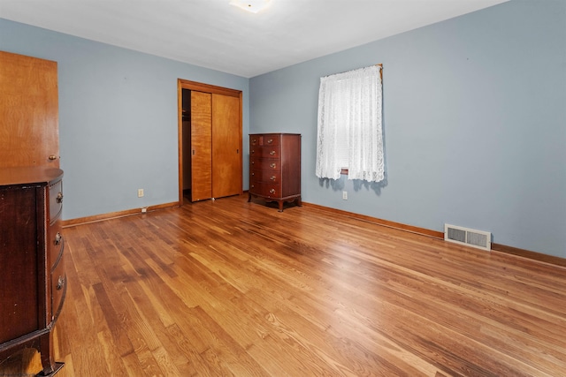 1060 Takoma St, Morgantown, WV 26505 - unfurnished bedroom with light wood-type flooring, baseboards, a closet, and visible vents