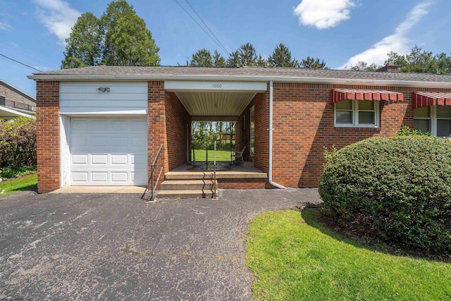 1060 Takoma St, Morgantown, WV 26505 - ranch-style house featuring a garage, a chimney, a shingled roof, brick siding, and driveway