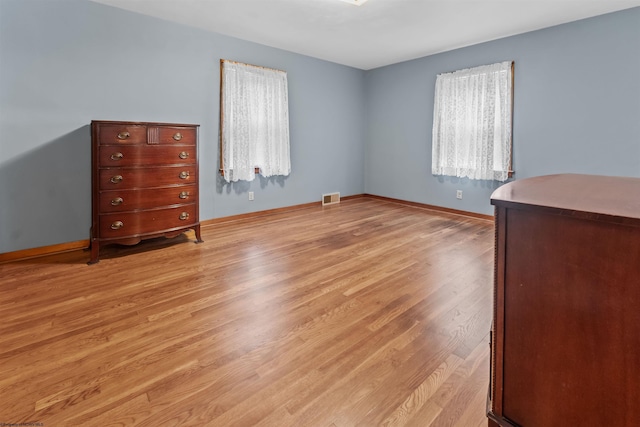 1060 Takoma St, Morgantown, WV 26505 - unfurnished bedroom with light wood finished floors, baseboards, and visible vents