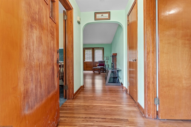 1060 Takoma St, Morgantown, WV 26505 - hall with wood finished floors, baseboards, and arched walkways