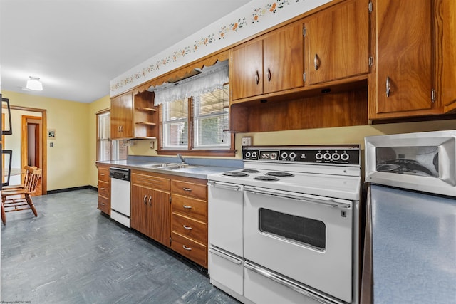 1060 Takoma St, Morgantown, WV 26505 - kitchen with a sink, brown cabinetry, and white appliances