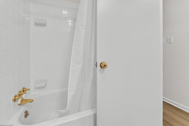 277 Randolph Rd, Morgantown, WV 26505 - full bath featuring wood finished floors, shower / tub combo, and baseboards