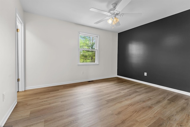 277 Randolph Rd, Morgantown, WV 26505 - spare room featuring baseboards, ceiling fan, light wood-style flooring, and visible vents