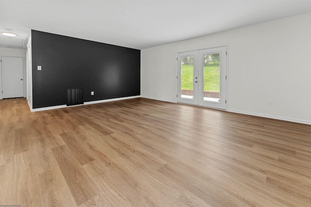 277 Randolph Rd, Morgantown, WV 26505 - spare room with light wood finished floors, baseboards, and french doors