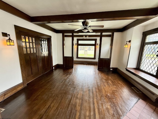 108 Marshall St, Mannington, WV 26582 - foyer entrance featuring beamed ceiling, hardwood / wood-style floors, a ceiling fan, and baseboards