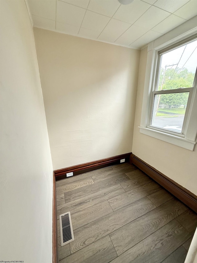 108 Marshall St, Mannington, WV 26582 - spare room featuring wood finished floors, baseboards, and baseboard heating