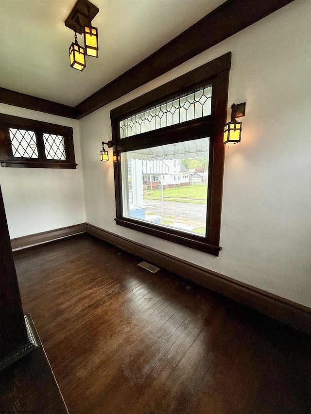 108 Marshall St, Mannington, WV 26582 - empty room featuring baseboards and dark wood-type flooring