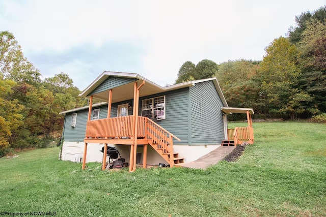 2081 Plum Run Rd, Mannington, WV 26582 - back of property featuring a yard, stairs, a deck, and crawl space