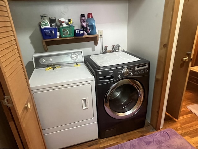 36 3rd St, Durbin, WV 26264 - clothes washing area featuring washing machine and clothes dryer and wood finished floors
