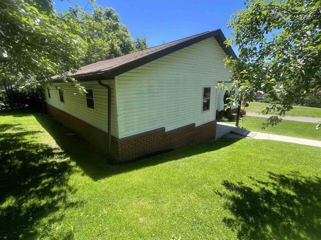 36 3rd St, Durbin, WV 26264 - view of property exterior featuring a yard