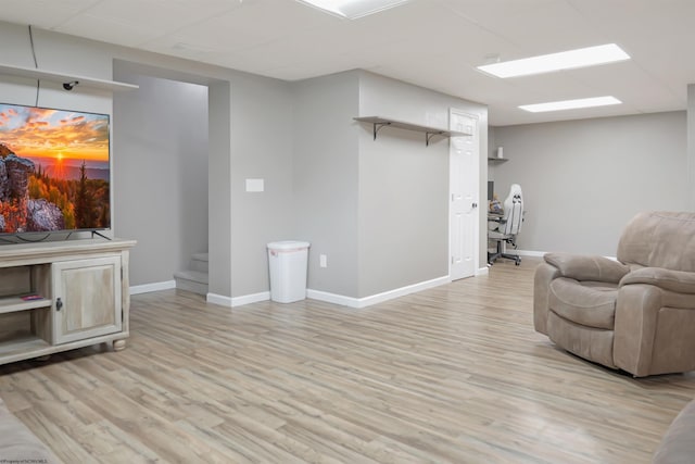 16 Cardinal Ln, Terra Alta, WV 26764 - living area featuring light wood-style flooring, baseboards, stairway, and a paneled ceiling
