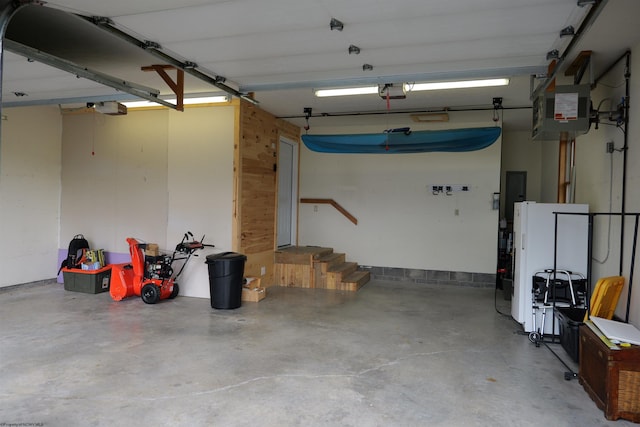 16 Cardinal Ln, Terra Alta, WV 26764 - garage with a garage door opener and electric panel