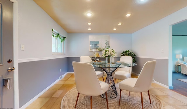 dining area with recessed lighting, baseboards, and light tile patterned floors